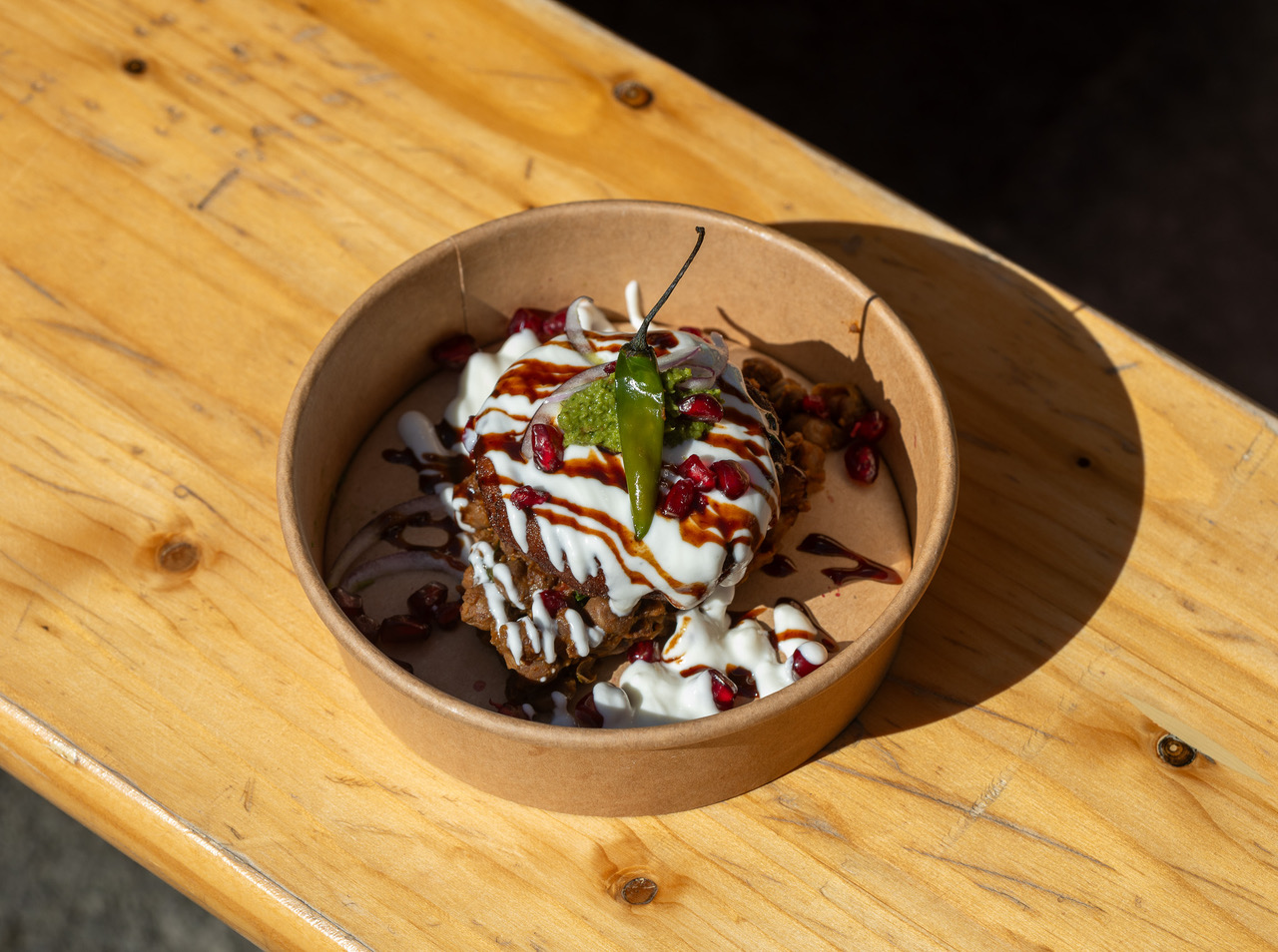 Aloo tikki chat with pomegranate and yoghurt