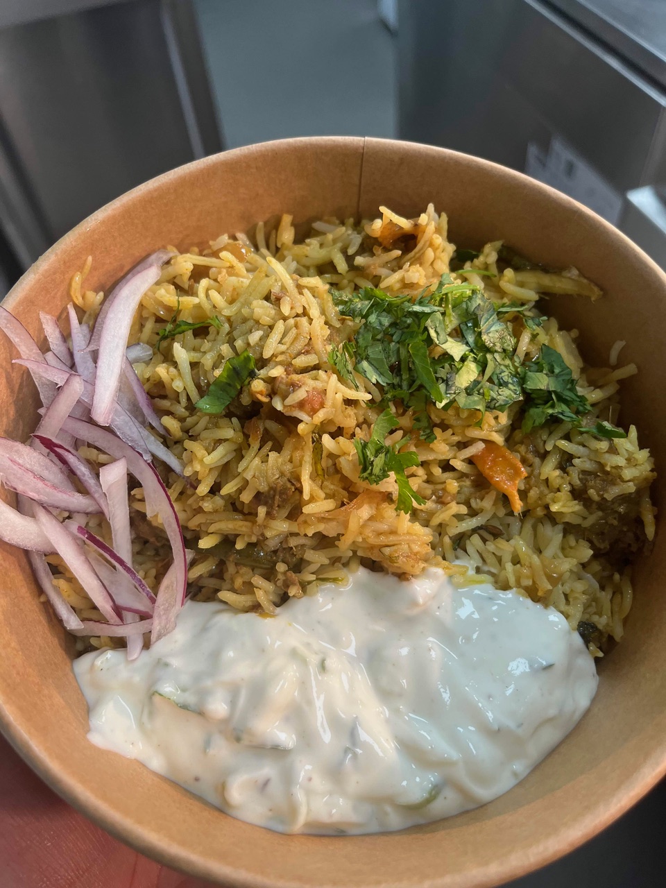 Lamb biryani with raita